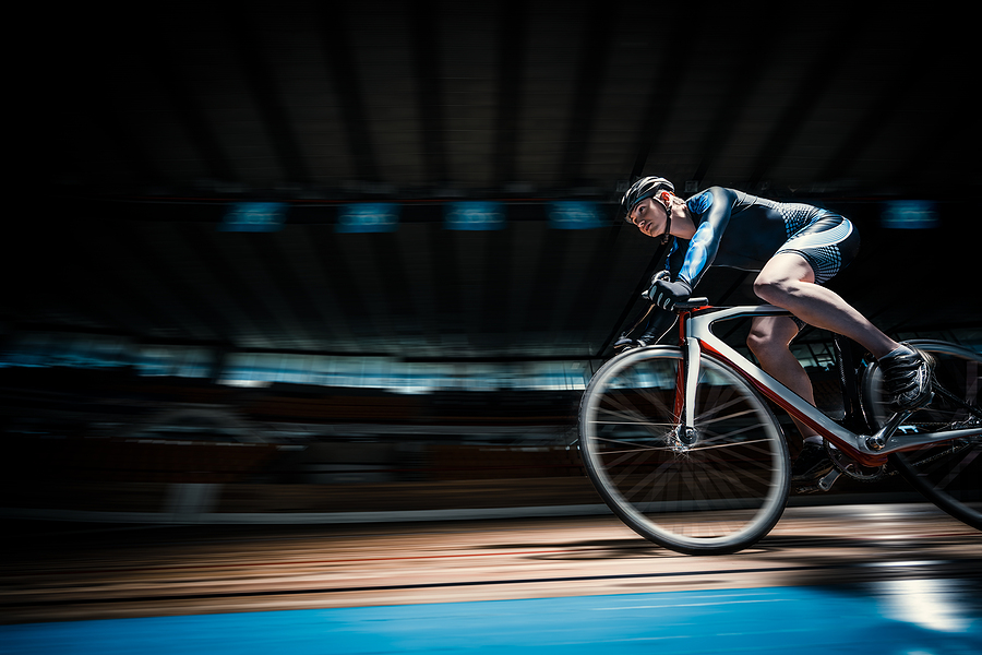 Racing cyclist on velodrome